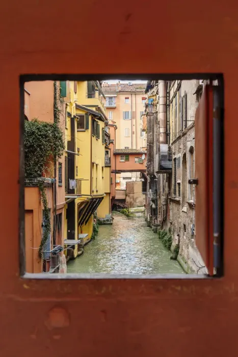 Framed Print : View to the canal through square window, Bologna, Emilia-Romagna, Italy Framed Print : View to the canal through square window, Bologna, Emilia-Romagna, Italy