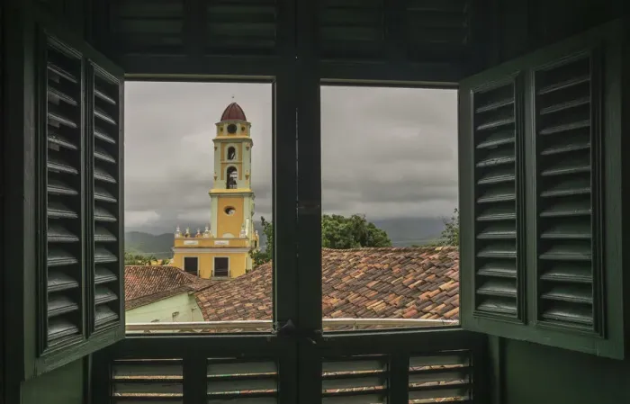 Framed Print : View of a church from a colonial window Framed Print : View of a church from a colonial window
