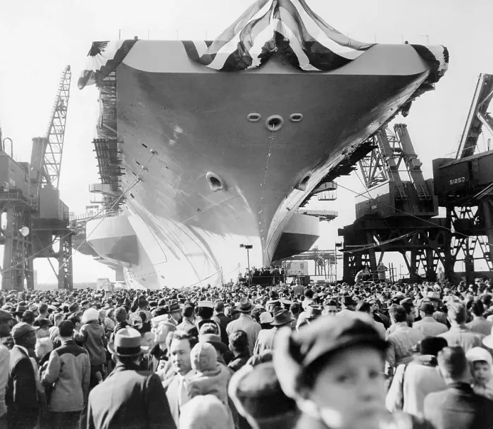 Framed Print : View of Citizens Dwarfed by Giant Military Carrier Framed Print : View of Citizens Dwarfed by Giant Military Carrier