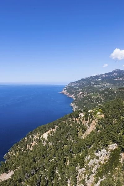 View of the cliffs with a remote house near Estellencs, Serra de Tramuntana, Northwestern Coast, Mallorca, Balearic Islands, Mediterranean Sea, Spain, Europe