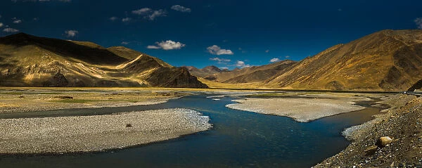 Creek. View of creek through valley in Tibet