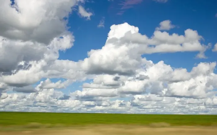Framed Print : View of Cumulus Clouds Spread Over Green Fields Framed Print : View of Cumulus Clouds Spread Over Green Fields