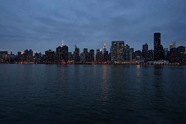View of East River and midtown Manhattan at night