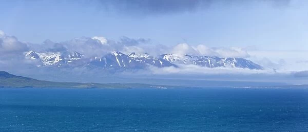 View across the Eyjafoerdur to the snow-capped mountains near Dalvik, Akureyri, Iceland, Europe