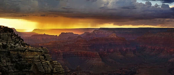 View of the Grand Canyon at sunset with storm clouds, viewing point Mather Point, South Rim, Grand Canyon, at Tusayan, Arizona, USA