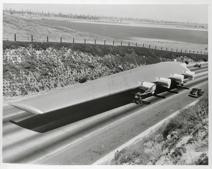 Framed Print : View of Howard Hughes Flying Boat Wing Next to Car Framed Print : View of Howard Hughes Flying Boat Wing Next to Car