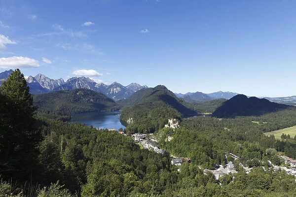 View from Jugend lookout point over Lake Alpsee and Schloss Hohenschwangau Castle towards the Tannheimer Mountains, Ostallgaeu, Allgaeu, Schwaben, Bavaria, Germany, Europe