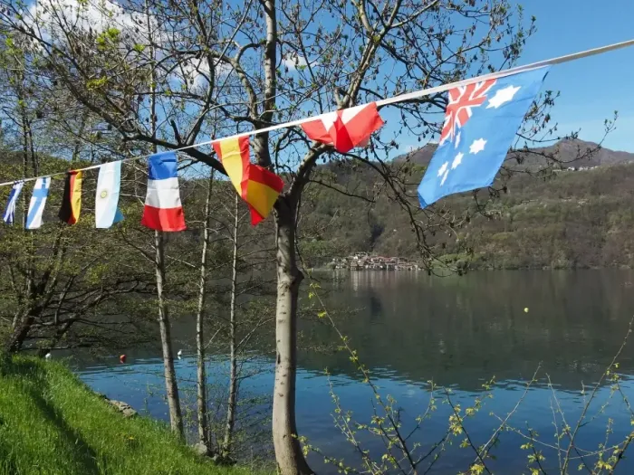 Framed Print : View Of Lake Orta With International Flags In The Foreground Framed Print : View Of Lake Orta With International Flags In The Foreground