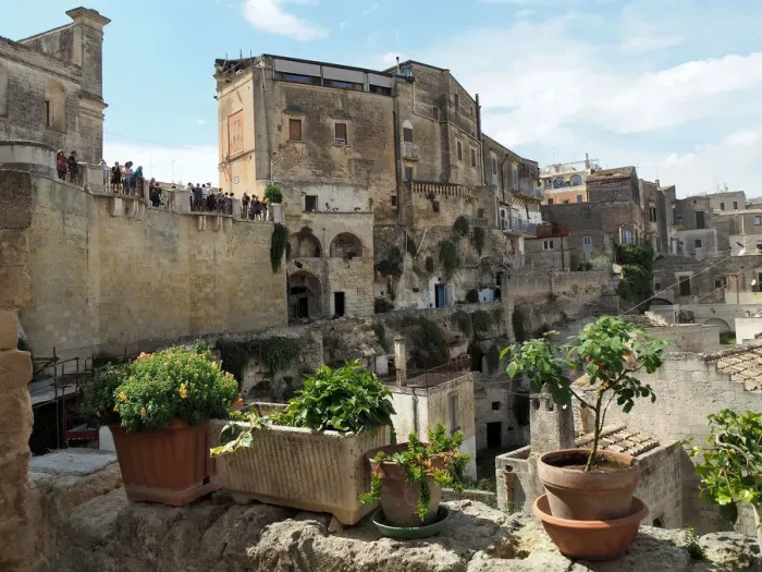 Framed Print : View Of Matera From Terrace With Vases Of Flowers, Basilicata, Southern Italy Framed Print : View Of Matera From Terrace With Vases Of Flowers, Basilicata, Southern Italy