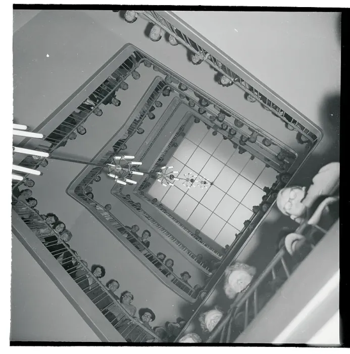 Framed Print : View of People Peering Down Open Stairwell Framed Print : View of People Peering Down Open Stairwell