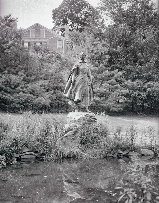 Framed Print : View of Pilgrim Maid Statue on a Rock Framed Print : View of Pilgrim Maid Statue on a Rock