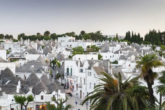 Framed Print : View of the Rione Monti district at dusk, trulli, traditional round houses, trullo settlement, Alberobello, Valle dItria, Trulli Valley, Apulia, Italy Framed Print : View of the Rione Monti district at dusk, trulli, traditional round houses, trullo settlement, Alberobello, Valle dItria, Trulli Valley, Apulia, Italy