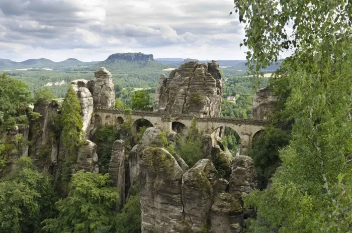 Framed Print : View of the rocks of the Bastei and the Basteibruecke bridge, behind Mt. Lilienstein, Elbe Sandstone Mountains, Saxony, Germany, Europe Framed Print : View of the rocks of the Bastei and the Basteibruecke bridge, behind Mt. Lilienstein, Elbe Sandstone Mountains, Saxony, Germany, Europe