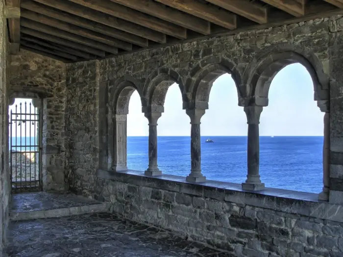 Framed Print : View through the romanesque loggia of St. Peter church in Porto Venere, Italy Framed Print : View through the romanesque loggia of St. Peter church in Porto Venere, Italy