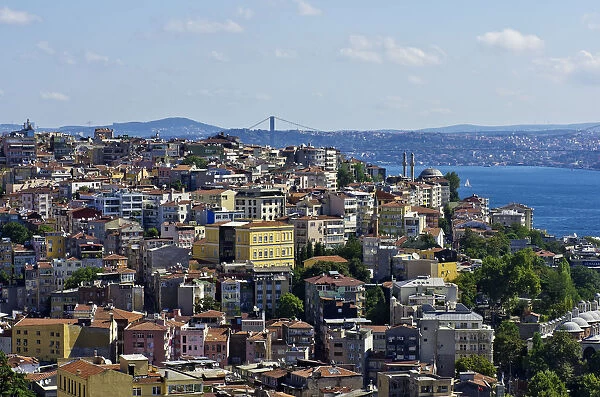View over the rooftops of Besiktas and Beyoglu towards the Bosphorus, as seen from the Galata Tower, Kuelesi, Istanbul, Turkey