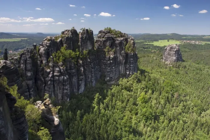 Framed Print : View of Schrammsteine ridge, jagged rock formation and Falkenstein rock, Elbe Sandstone Mountains, Saxony, Germany, Europe Framed Print : View of Schrammsteine ridge, jagged rock formation and Falkenstein rock, Elbe Sandstone Mountains, Saxony, Germany, Europe