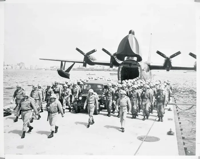 Framed Print : View of Soldiers Disembarking from Plane Framed Print : View of Soldiers Disembarking from Plane