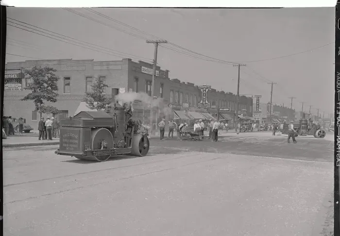 Framed Print : View of Steamroller Moving Down Street Framed Print : View of Steamroller Moving Down Street