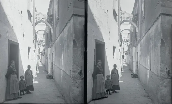 Framed Print : View of Street with Family in Doorway Framed Print : View of Street with Family in Doorway