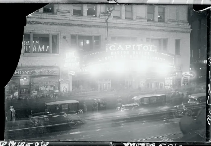 Framed Print : View of Theater as Cars Pass By