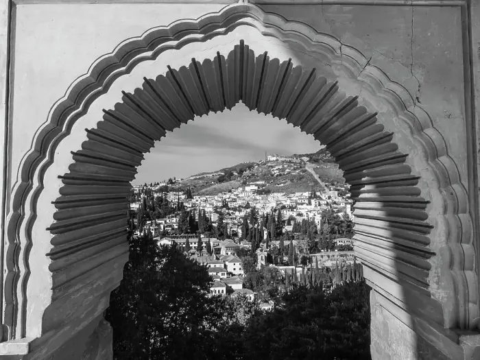 Framed Print : View of the town of Ubeda through a decorative archway Framed Print : View of the town of Ubeda through a decorative archway