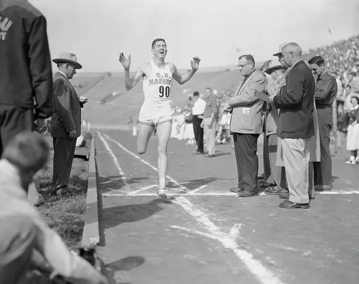 Framed Print : View of Wes Santee Winning Race