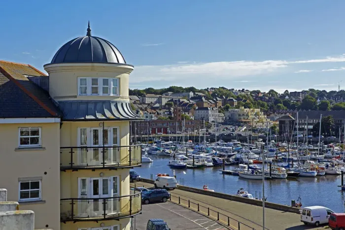 Framed Print : View over Weymouth harbour with blue skies