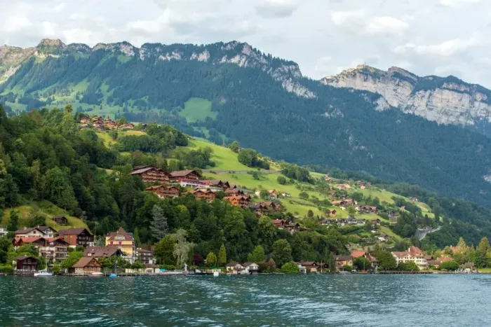 Framed Print : The village and landscape beside lake Thun, Switzer