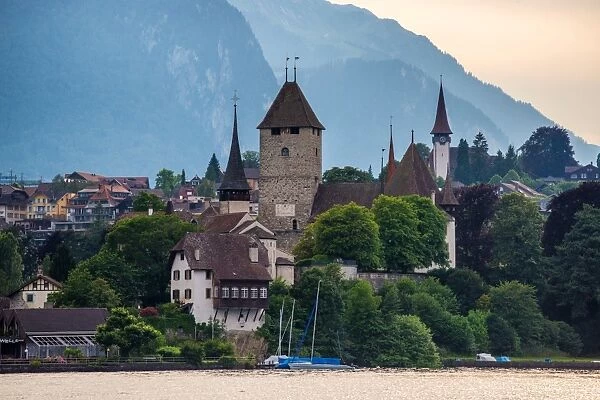 The village locates beside lake Thun, Switzerland