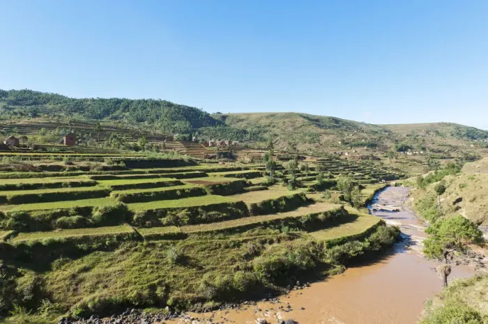 Framed Print : Villages of the Merina people with terraced rice paddies above a river, near Antananarivo, Madagascar