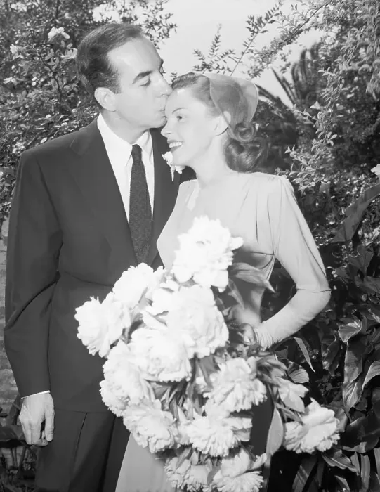 Framed Print : Vincente Minnelli Kisses Bride Judy Garland's Head