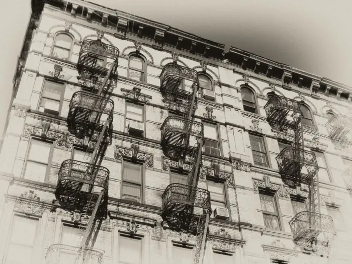Framed Print : Vintage, sepia-toned rendition of a New York City landmark: fire escapes in tenement building in the Lower East Side Framed Print : Vintage, sepia-toned rendition of a New York City landmark: fire escapes in tenement building in the Lower East Side