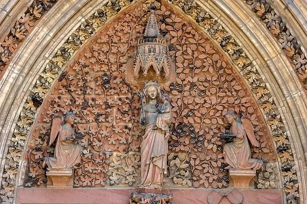 The Virgin Mary with angels in the tympanum of the portal of the Gothic St. Elizabeths Church, Marburg, Hesse, Germany