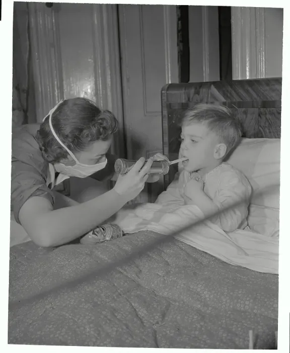 Framed Print : Visiting Nurse Checking Throat of Boy Framed Print : Visiting Nurse Checking Throat of Boy