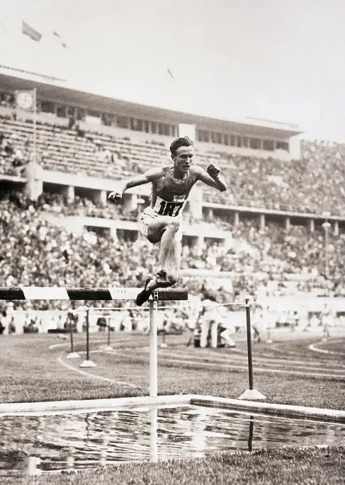 Framed Print : Volmari Iso-Hollo Hurdling in the 3000-Meter Steeplechase Framed Print : Volmari Iso-Hollo Hurdling in the 3000-Meter Steeplechase