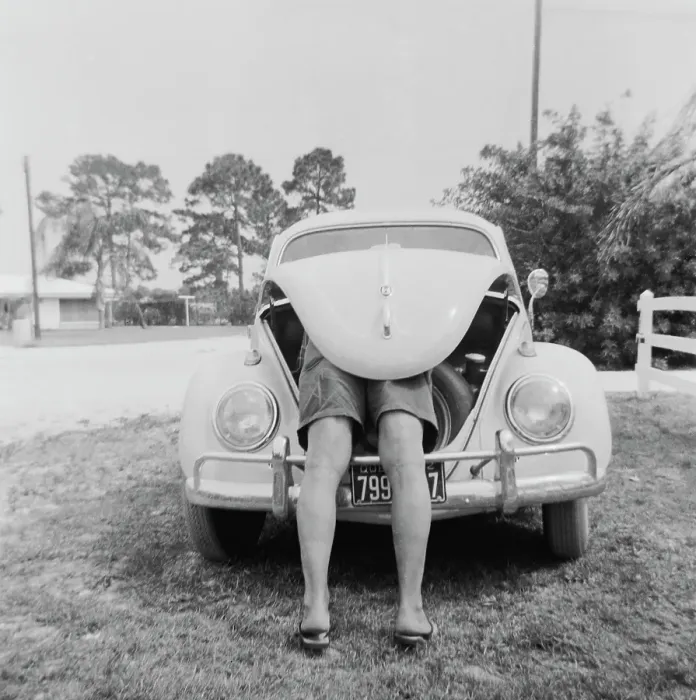 Framed Print : VW Beetle. A man reaches into the trunk of a Volkswagen Beetle, November 1962 Framed Print : VW Beetle. A man reaches into the trunk of a Volkswagen Beetle, November 1962