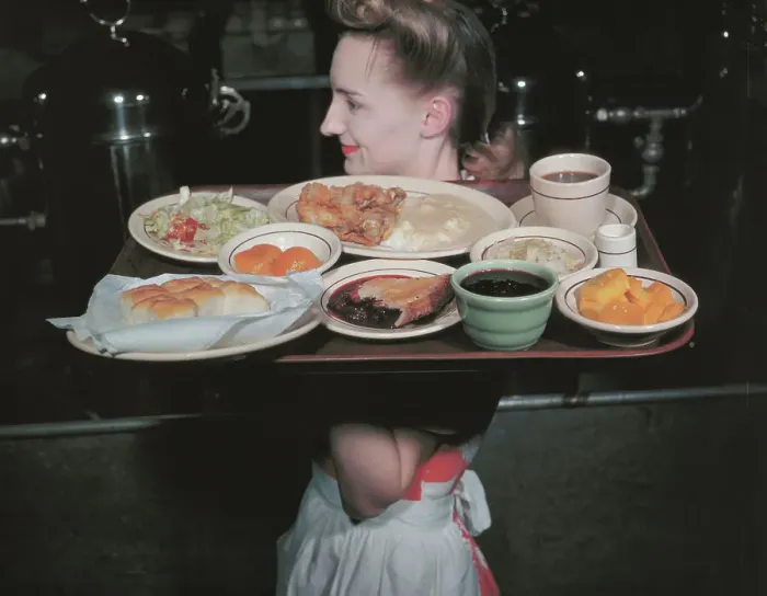 Framed Print : Waitress Carrying Tray of Food Framed Print : Waitress Carrying Tray of Food