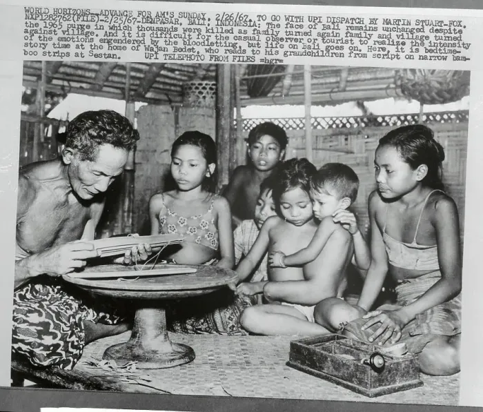Framed Print : Wajan Bedet Reading Stories to Family Framed Print : Wajan Bedet Reading Stories to Family