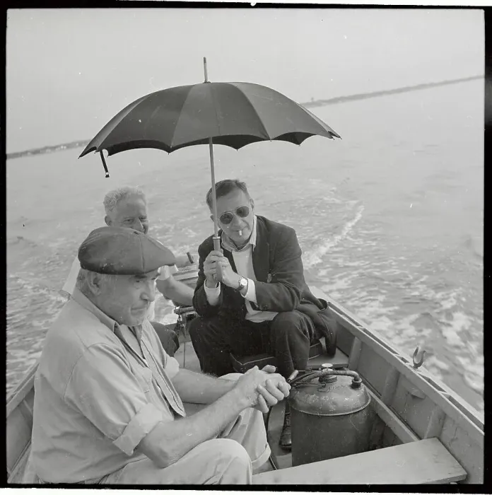 Framed Print : Walker Evans Holding Umbrella in a Boat Framed Print : Walker Evans Holding Umbrella in a Boat
