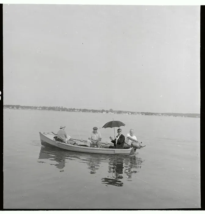 Framed Print : Walker Evans Sitting in Boat and Holding Umbrella Framed Print : Walker Evans Sitting in Boat and Holding Umbrella