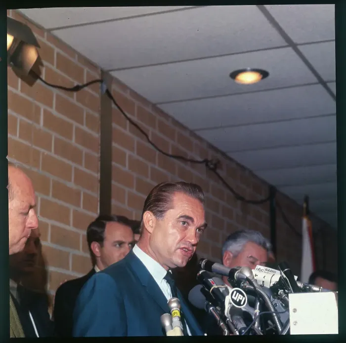 Framed Print : Wallace Talking With Reporters