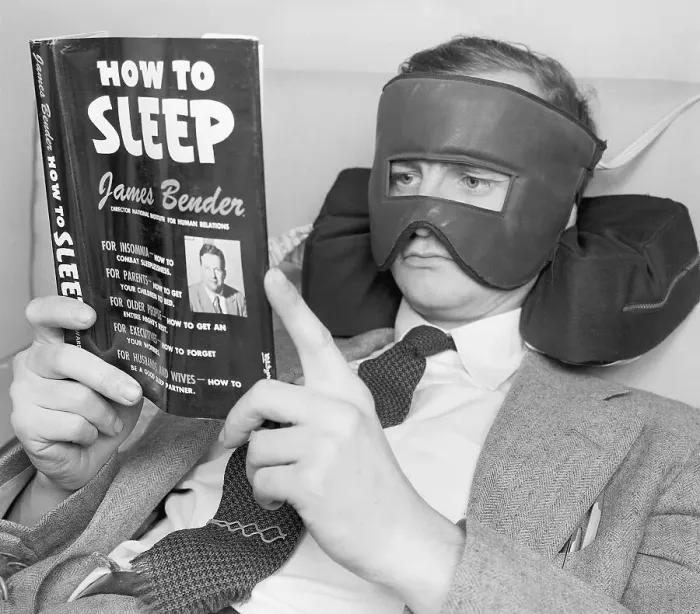 Framed Print : Wally Cox Wears Face Mask While Reading Framed Print : Wally Cox Wears Face Mask While Reading