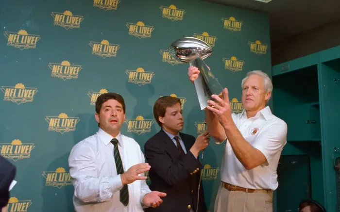Framed Print : Bill Walsh Holding Trophy Framed Print : Bill Walsh Holding Trophy