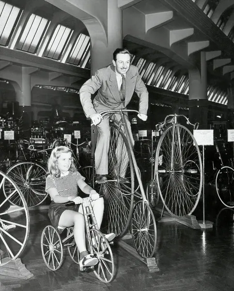 Walt Disney on High Bike, Daughter on Tri Print. Art Prints, Posters &  Puzzles from Fine Art Storehouse