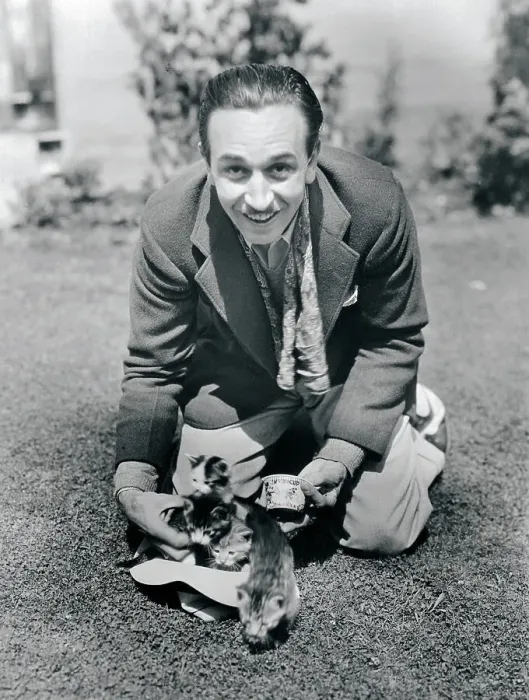 Framed Print : Walt Disney Kneeling on Lawn Framed Print : Walt Disney Kneeling on Lawn