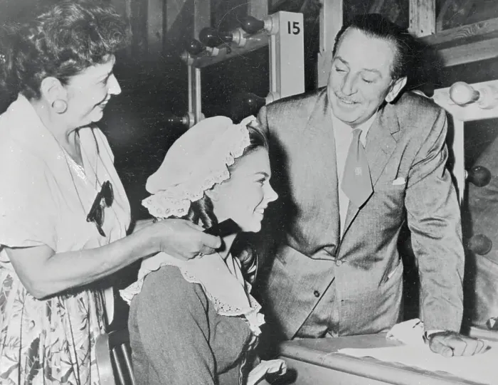 Framed Print : Walt Disney Observing His Daughter in Makeup Session Framed Print : Walt Disney Observing His Daughter in Makeup Session