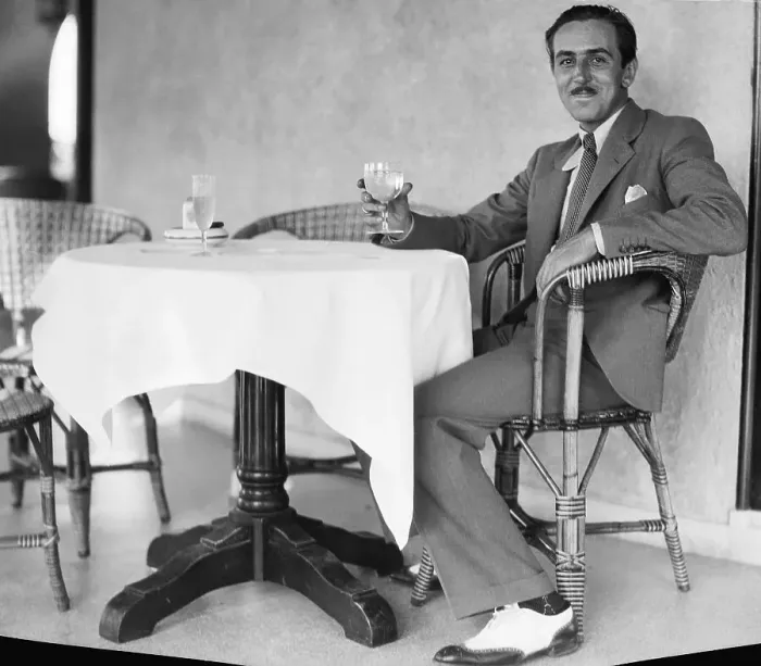 Framed Print : Walt Disney Sitting at Table Framed Print : Walt Disney Sitting at Table