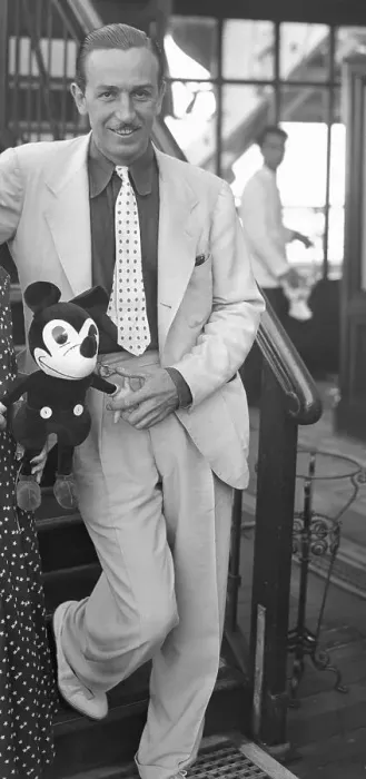 Framed Print : Walt Disney Standing with Mickey Mouse Doll Framed Print : Walt Disney Standing with Mickey Mouse Doll