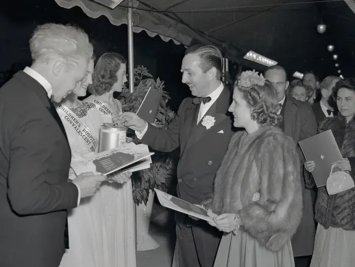 Framed Print : Walt Disney and Wife Arriving at Movie Premiere Framed Print : Walt Disney and Wife Arriving at Movie Premiere