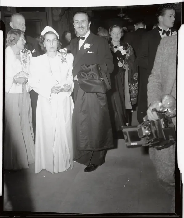 Framed Print : Walt Disney and Wife Arriving at Movie Premiere Framed Print : Walt Disney and Wife Arriving at Movie Premiere